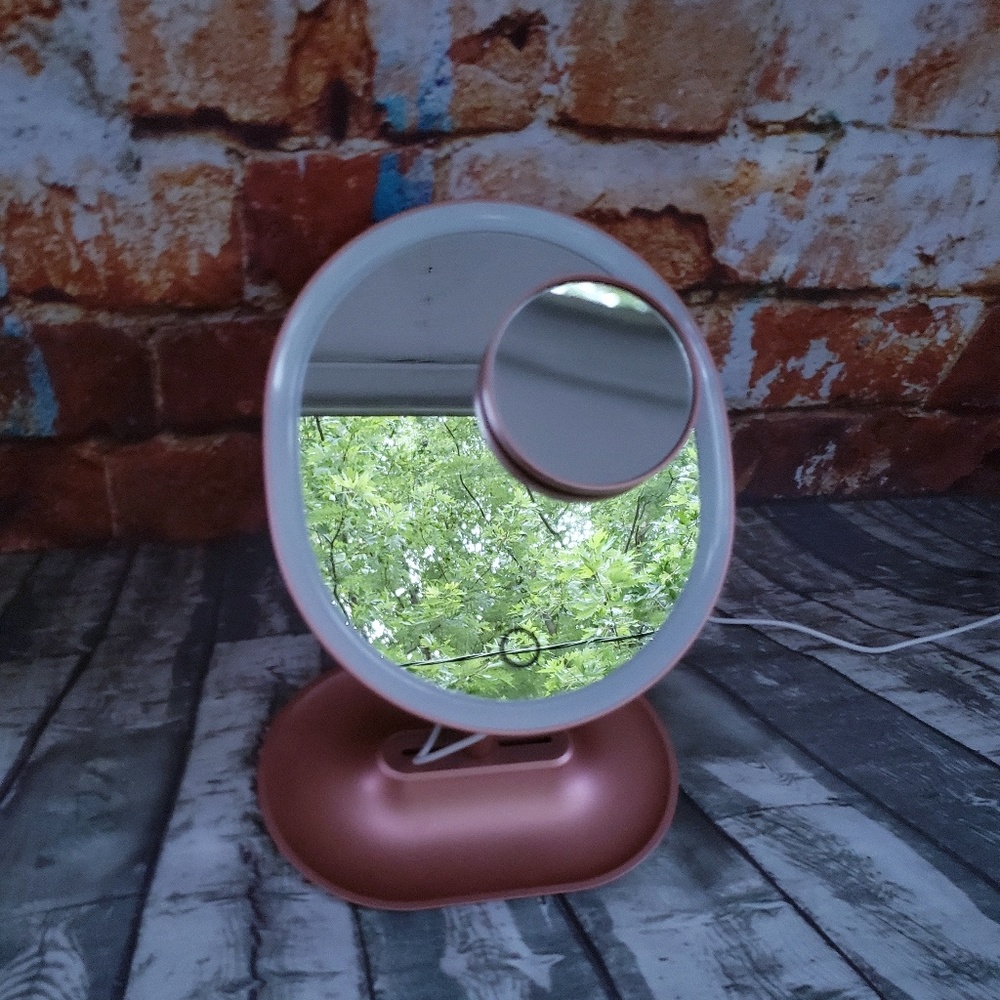 Rose gold LED magnifying mirror